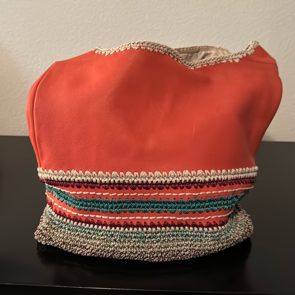 Colorful shoulder bag by the Sak.